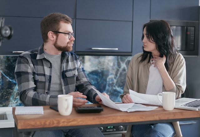 two people going over bills